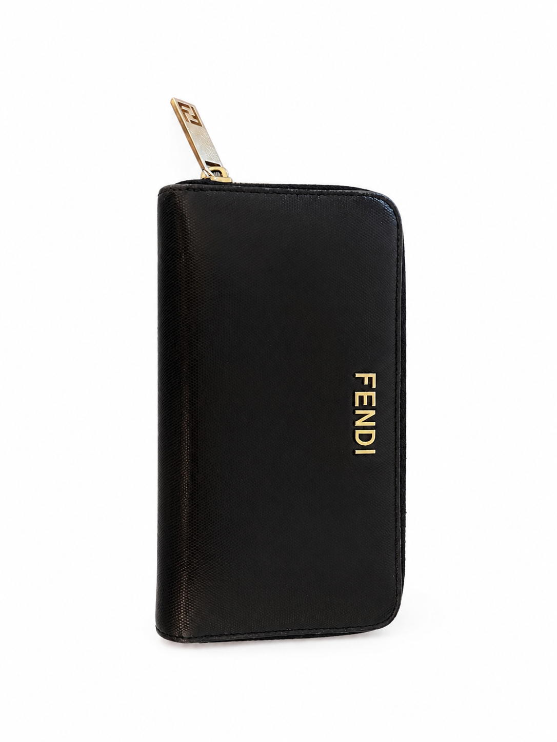 black Fendi zip-around continental wallet featuring a gold-toned metal logo plaque on the exterior