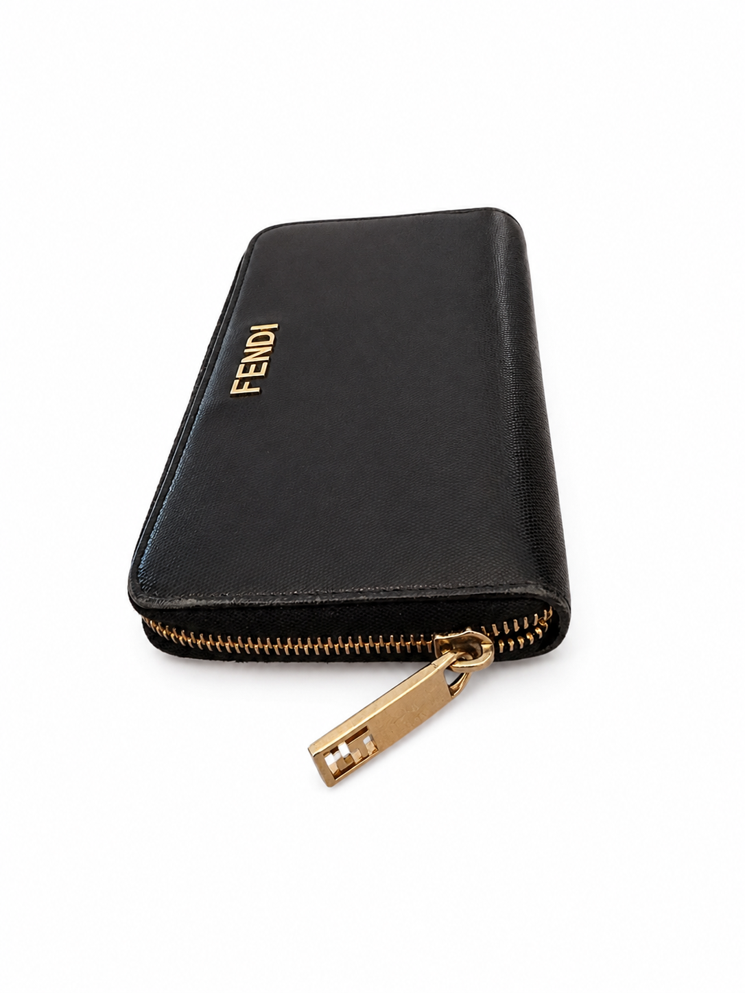 black Fendi zip-around continental wallet featuring a gold-toned metal logo plaque on the exterior