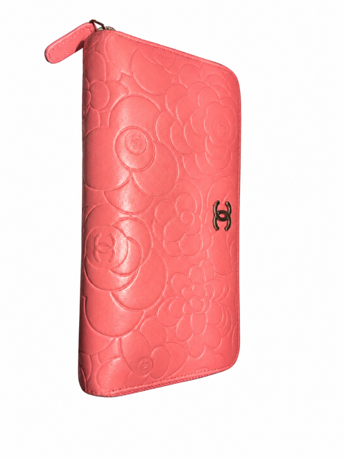 Chanel Pink Camellia Embossed Zip Around Wallet.