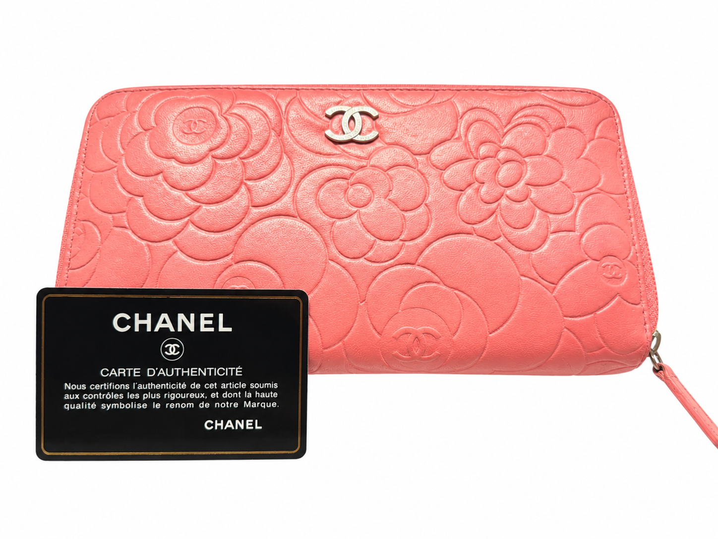 Chanel Pink Camellia Embossed Zip Around Wallet.