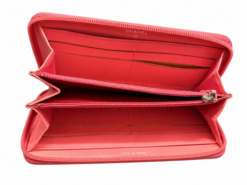 Chanel Pink Camellia Embossed Zip Around Wallet.