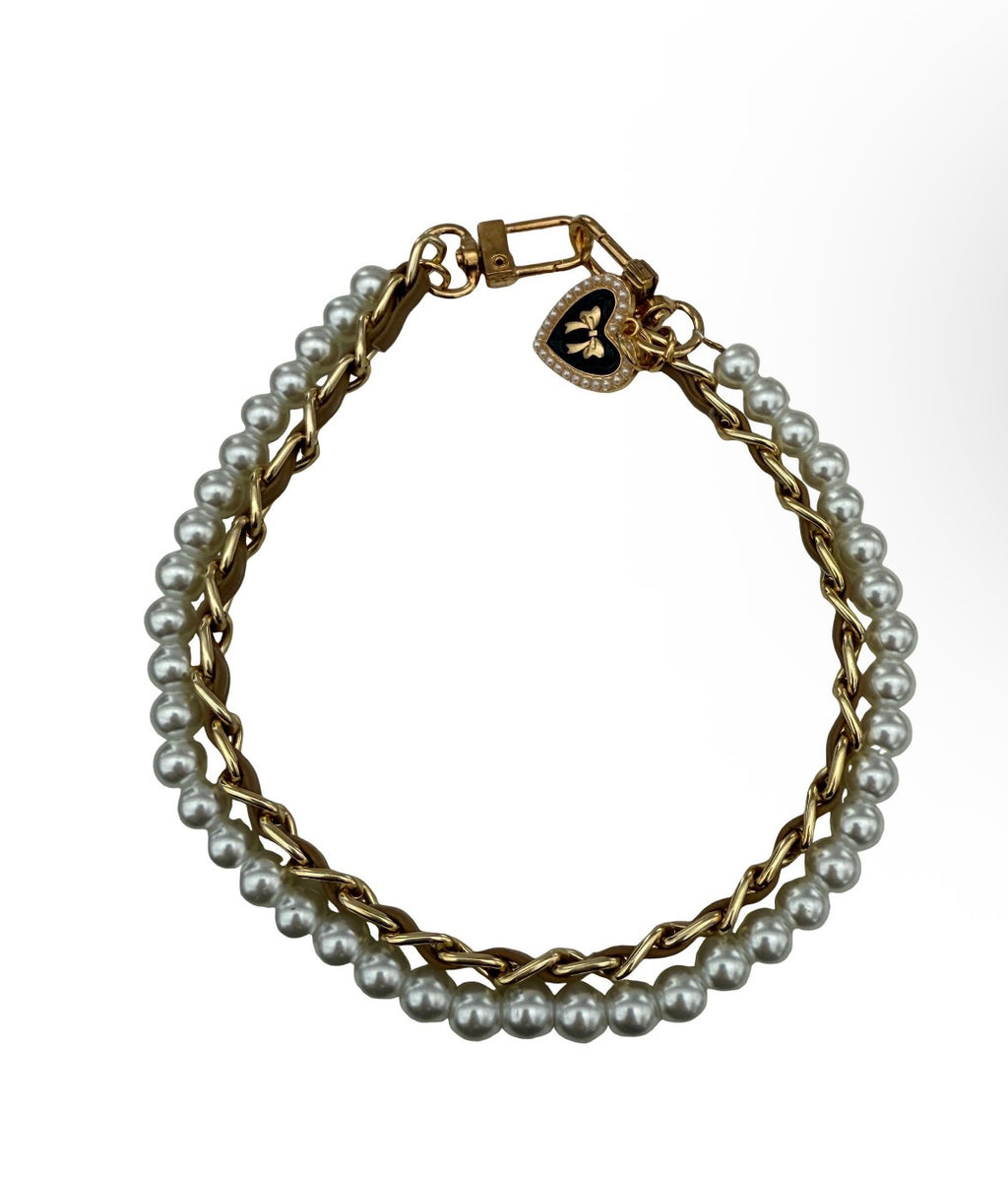 Golden Darling Strap" by Charmed Dollhouse features a mixed-media design combining a warm gold chain with a strand of lustrous pearls.