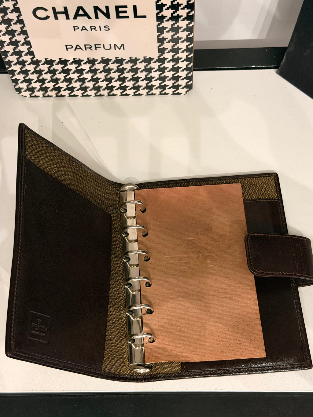 vintage Fendi agenda cover featuring the iconic brown and black Zucca FF monogram canvas with dark brown leather trim.