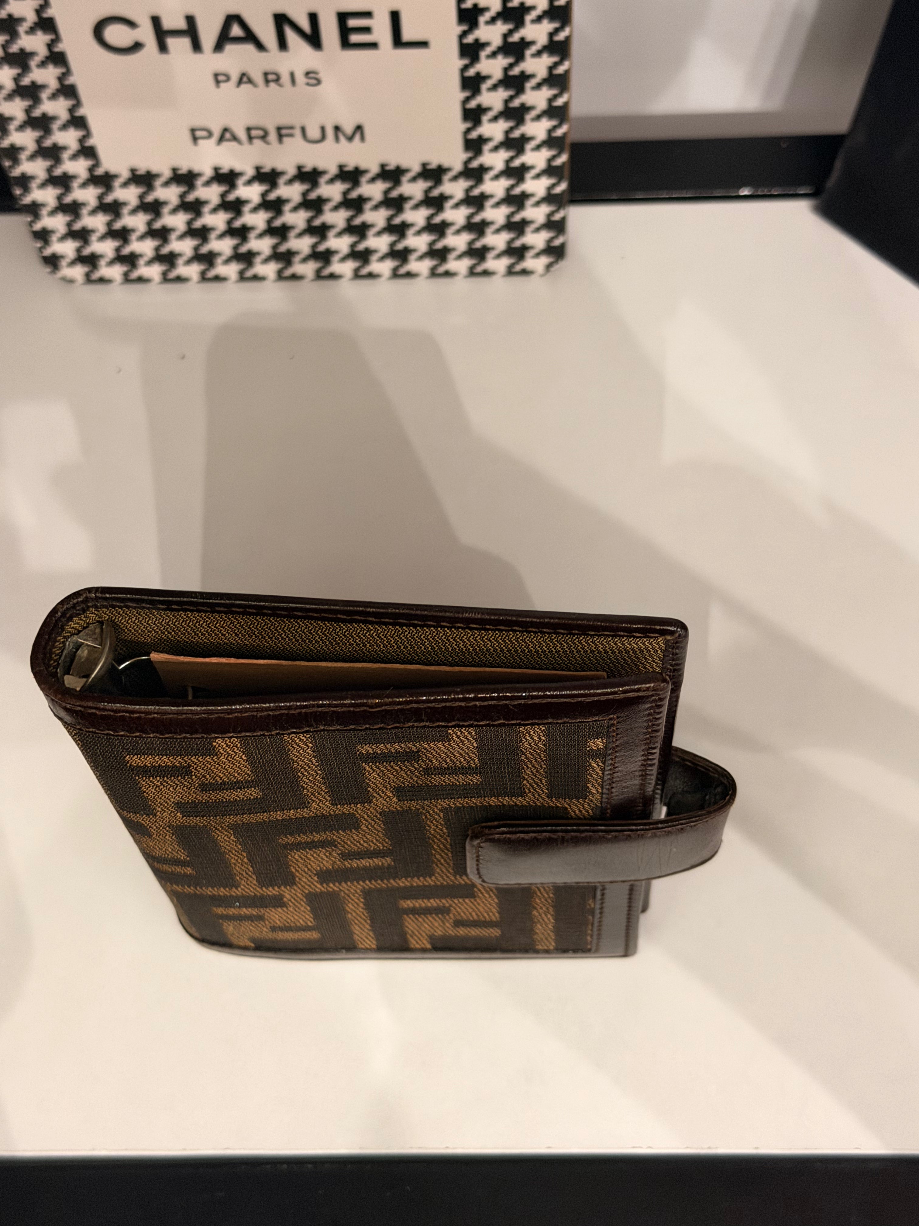 vintage Fendi agenda cover featuring the iconic brown and black Zucca FF monogram canvas with dark brown leather trim.