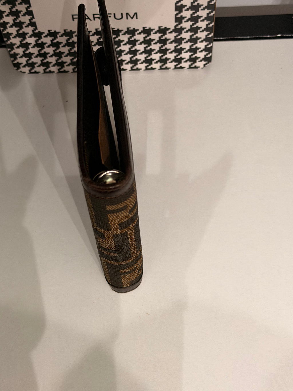 vintage Fendi agenda cover featuring the iconic brown and black Zucca FF monogram canvas with dark brown leather trim.