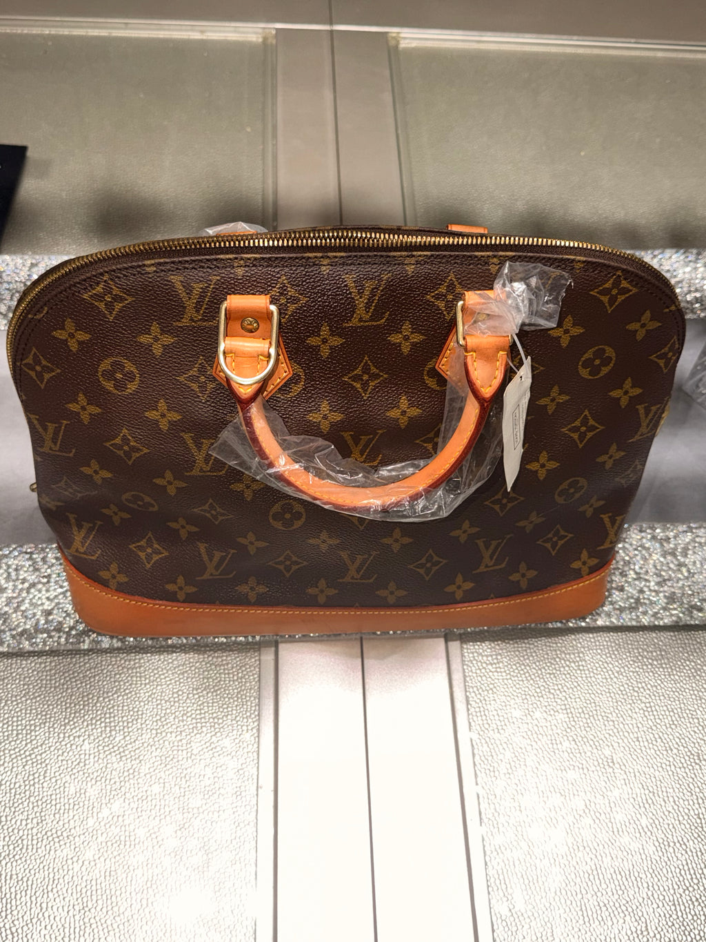 Louis Vuitton Alma PM Monogram Canvas Handbag