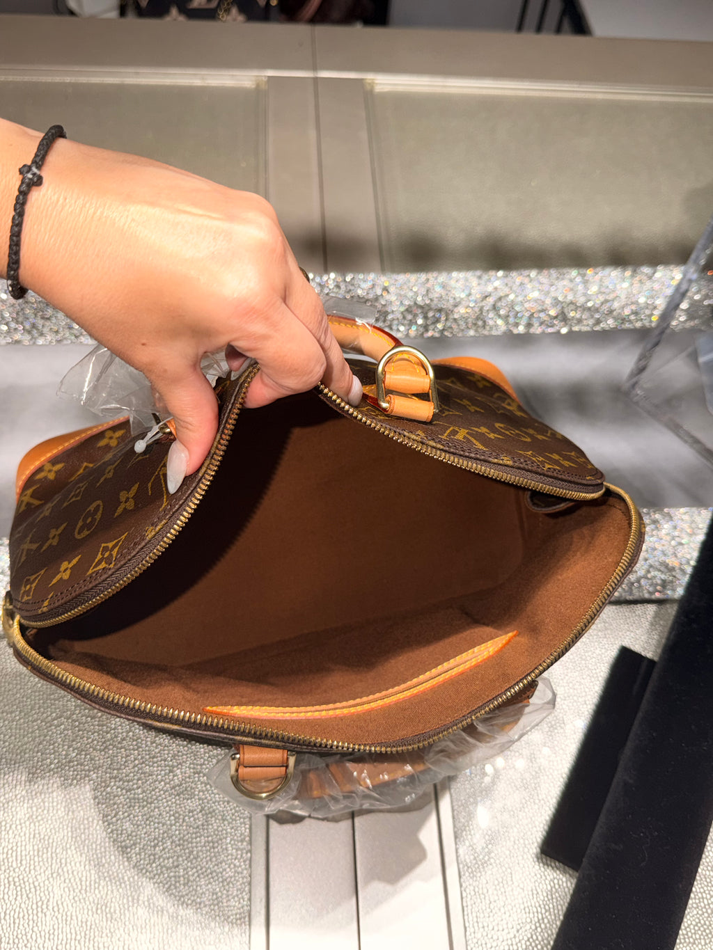 Louis Vuitton Alma PM Monogram Canvas Handbag