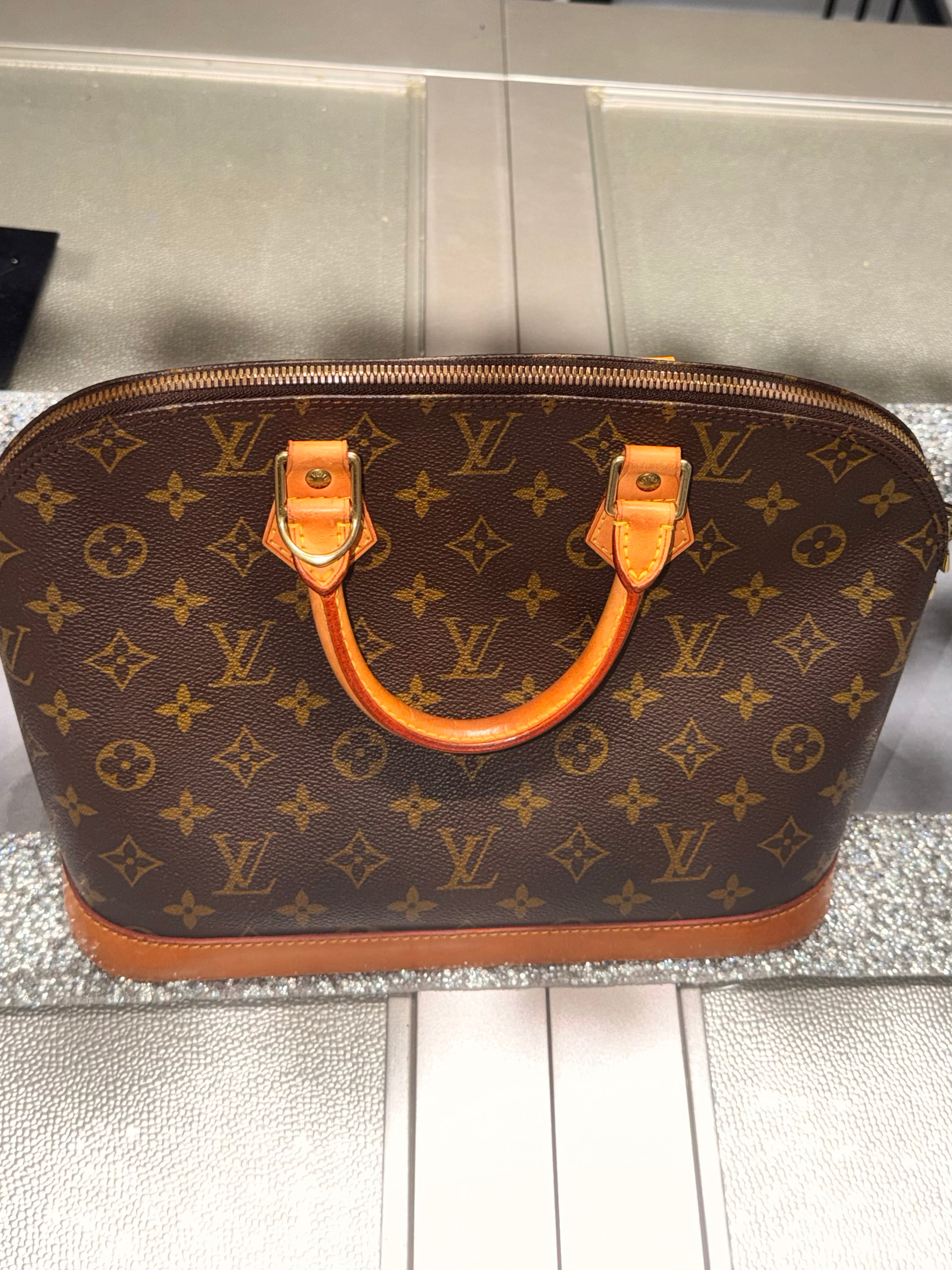 Louis Vuitton Alma PM Monogram Canvas Top Handle Bag