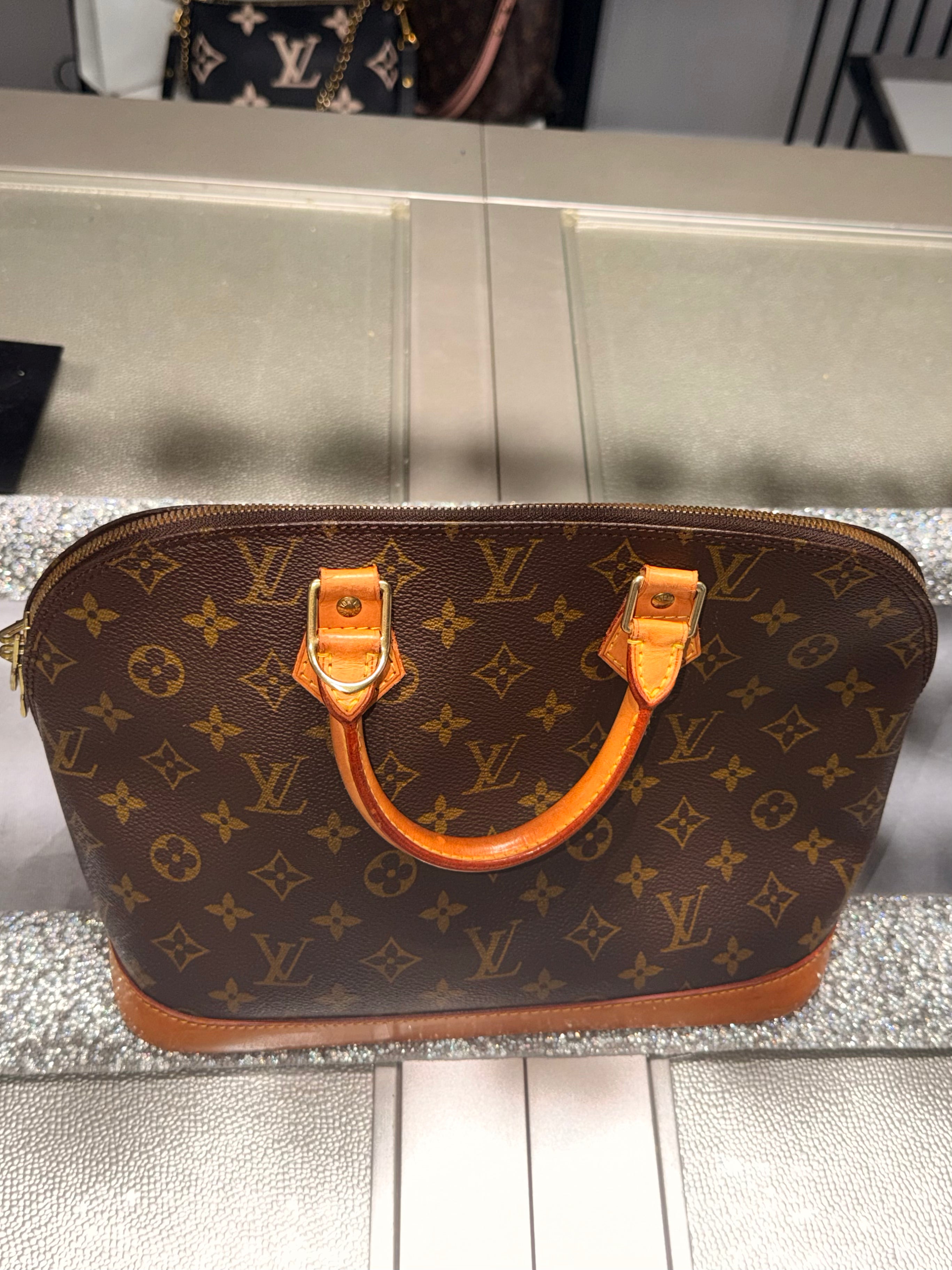 Louis Vuitton Alma PM Monogram Canvas Top Handle Bag