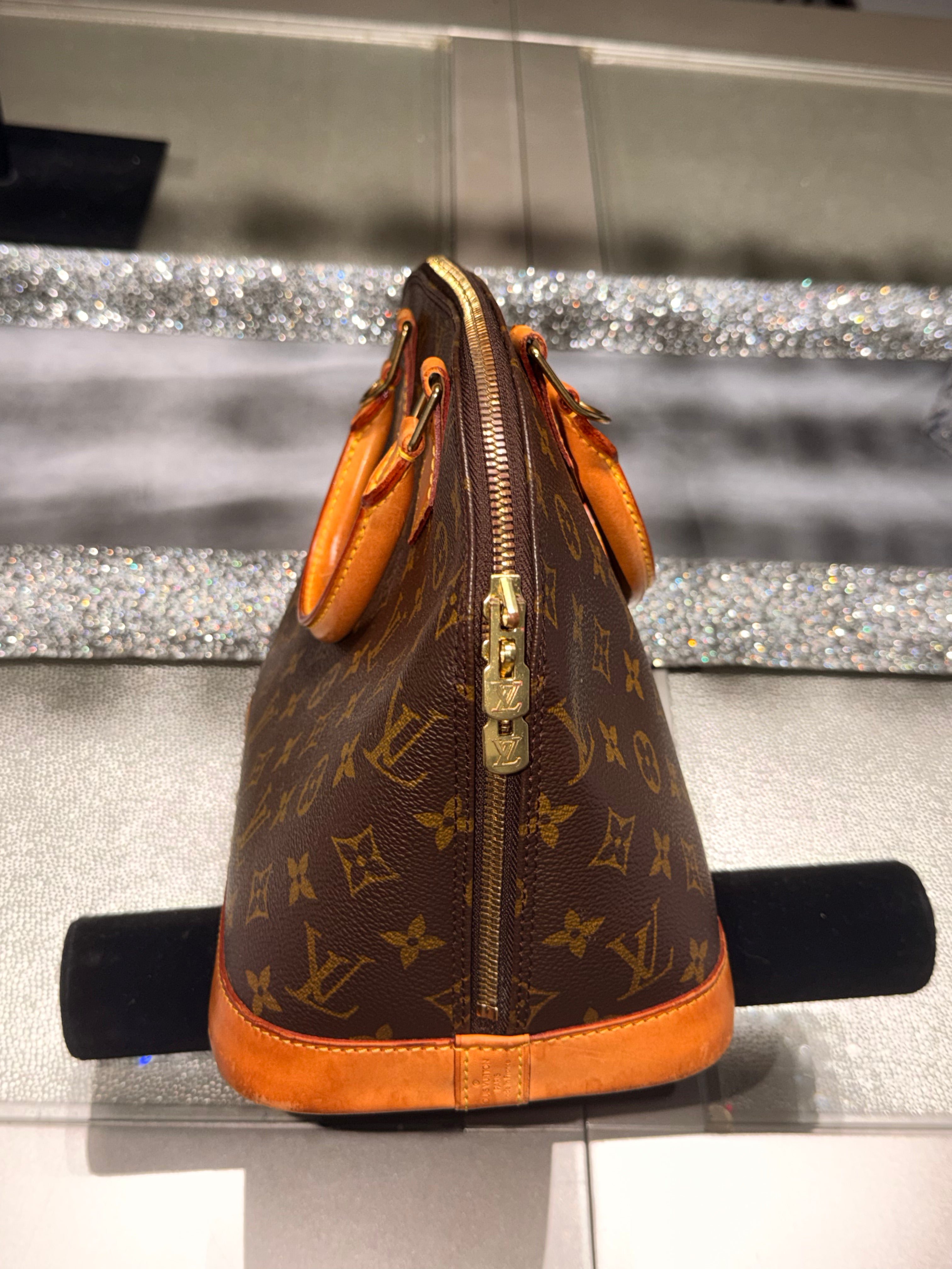 Louis Vuitton Alma PM Monogram Canvas Top Handle Bag