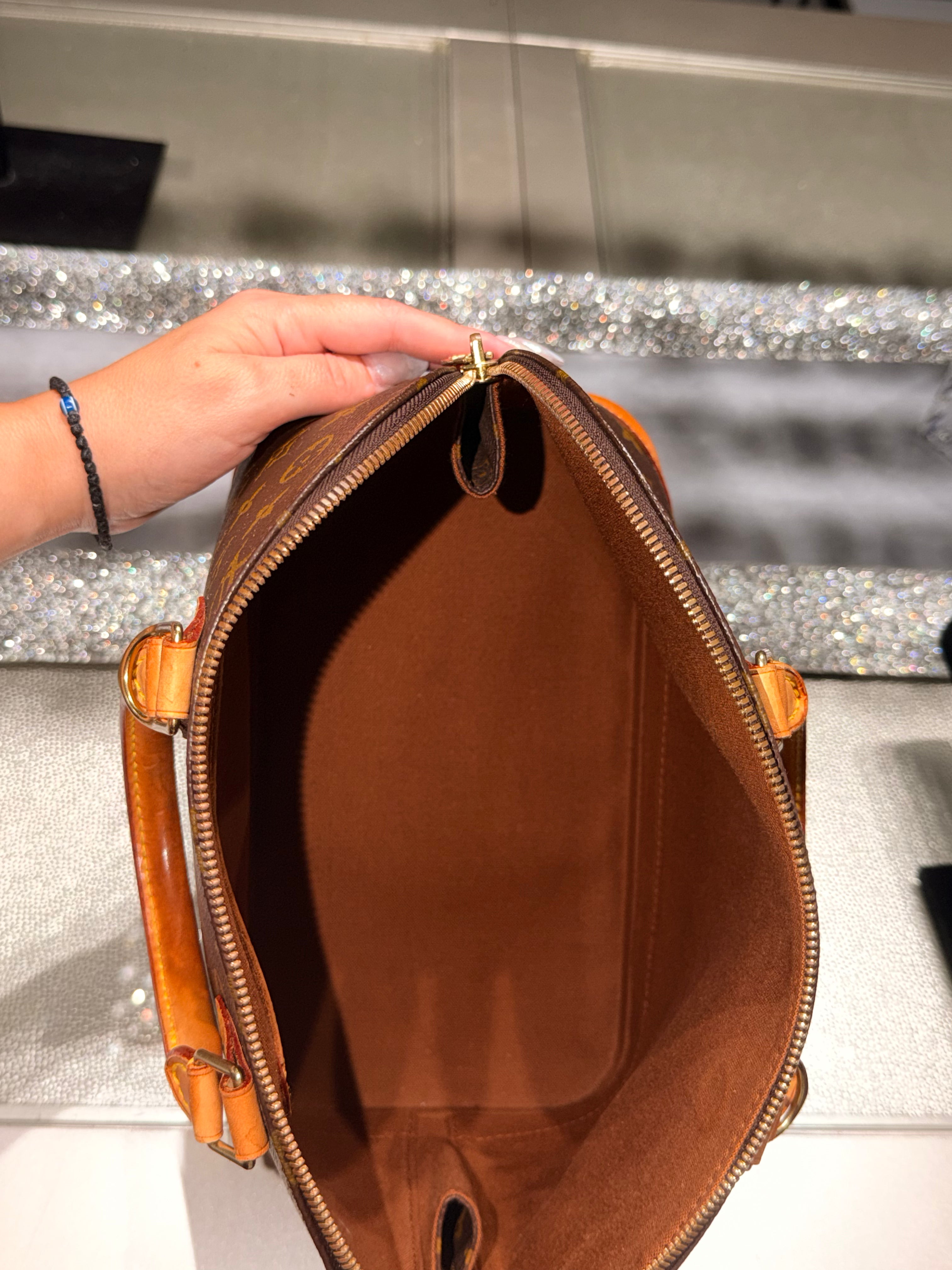 Louis Vuitton Alma PM Monogram Canvas Top Handle Bag