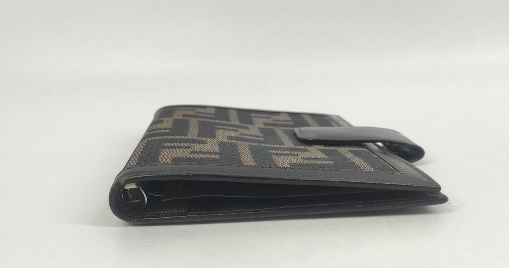 vintage Fendi agenda cover featuring the iconic brown and black Zucca FF monogram canvas with dark brown leather trim.