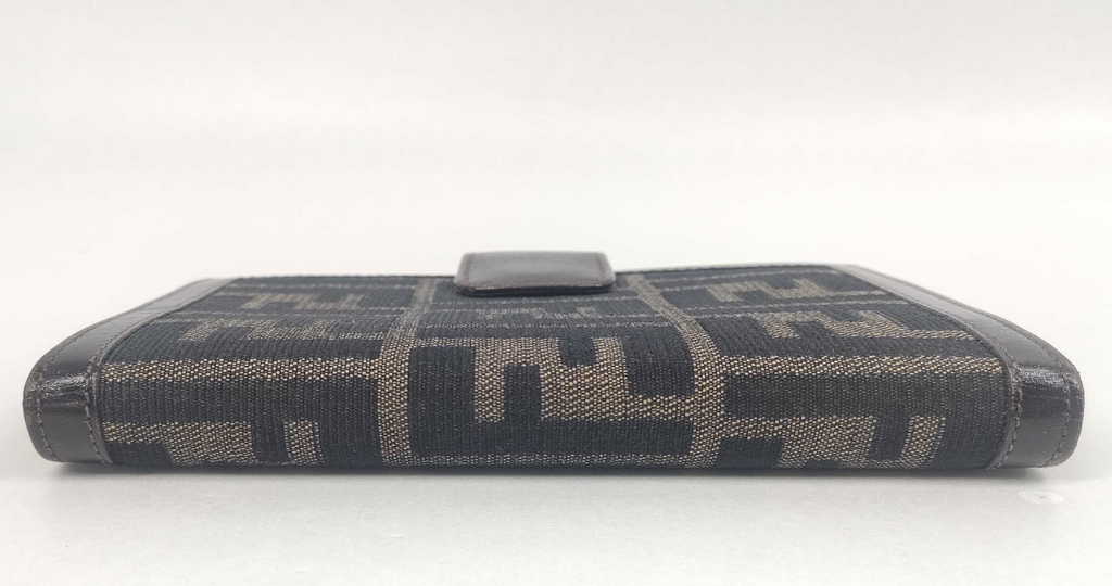 vintage Fendi agenda cover featuring the iconic brown and black Zucca FF monogram canvas with dark brown leather trim.
