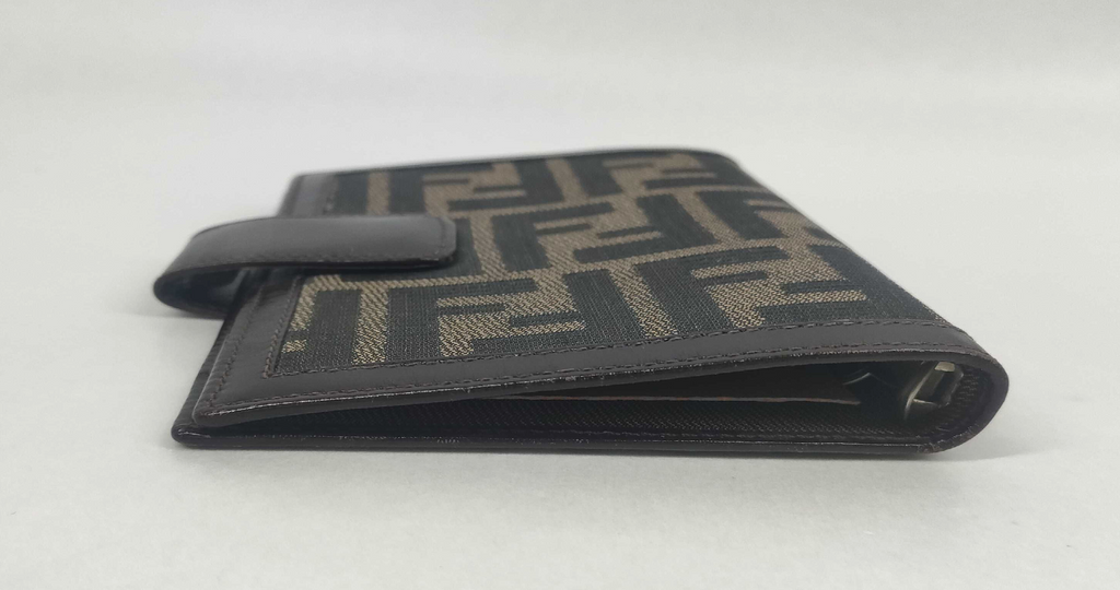 vintage Fendi agenda cover featuring the iconic brown and black Zucca FF monogram canvas with dark brown leather trim.
