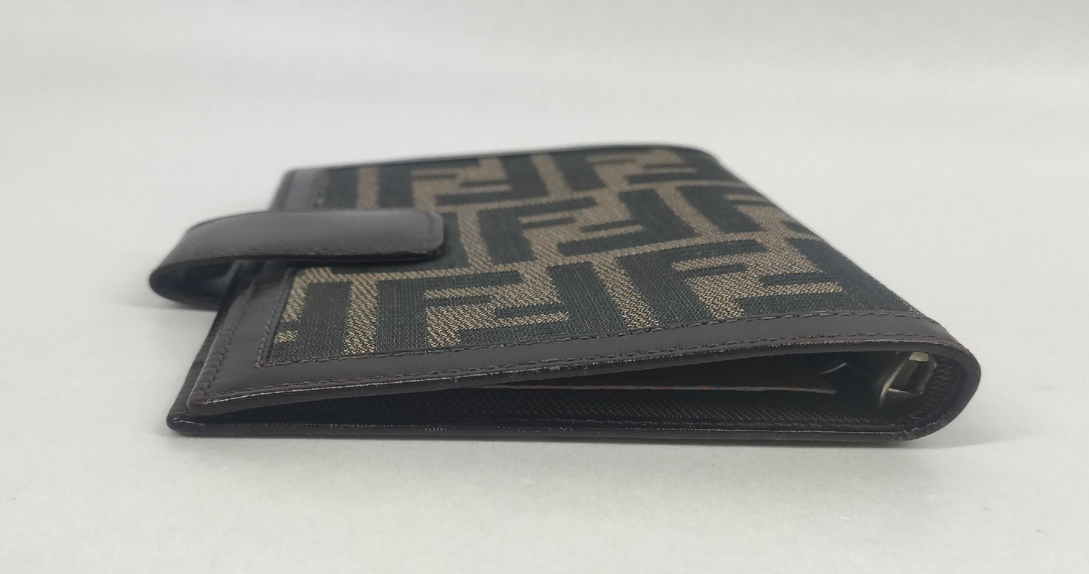 vintage Fendi agenda cover featuring the iconic brown and black Zucca FF monogram canvas with dark brown leather trim.