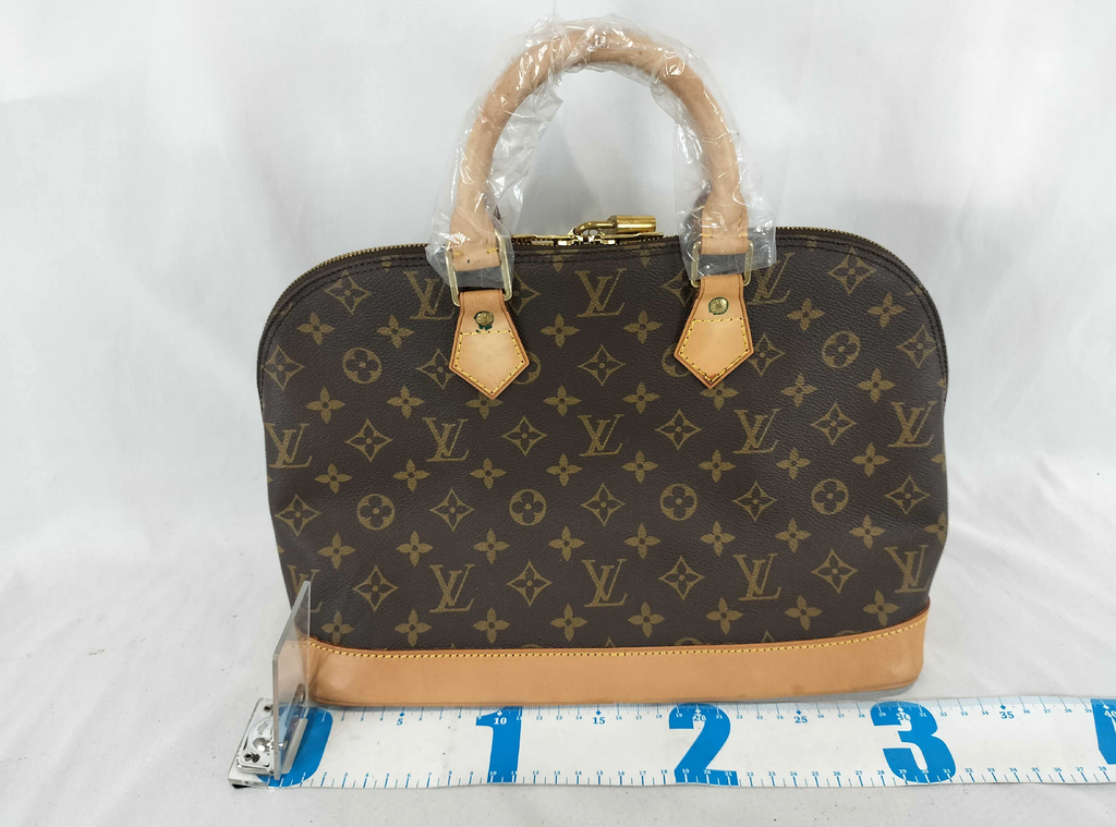 Louis Vuitton Alma PM Monogram Canvas Handbag