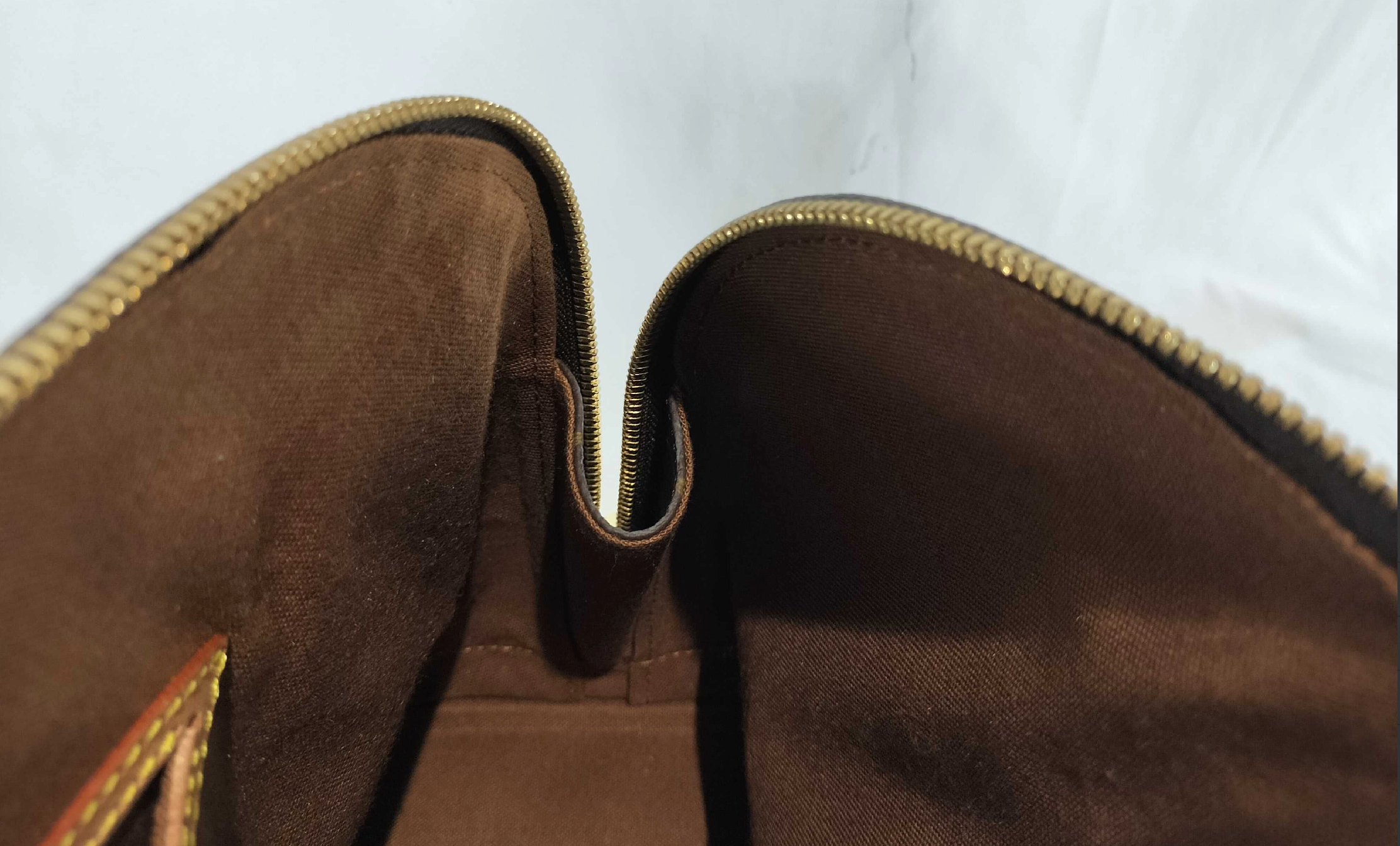 Louis Vuitton Alma PM Monogram Canvas Handbag