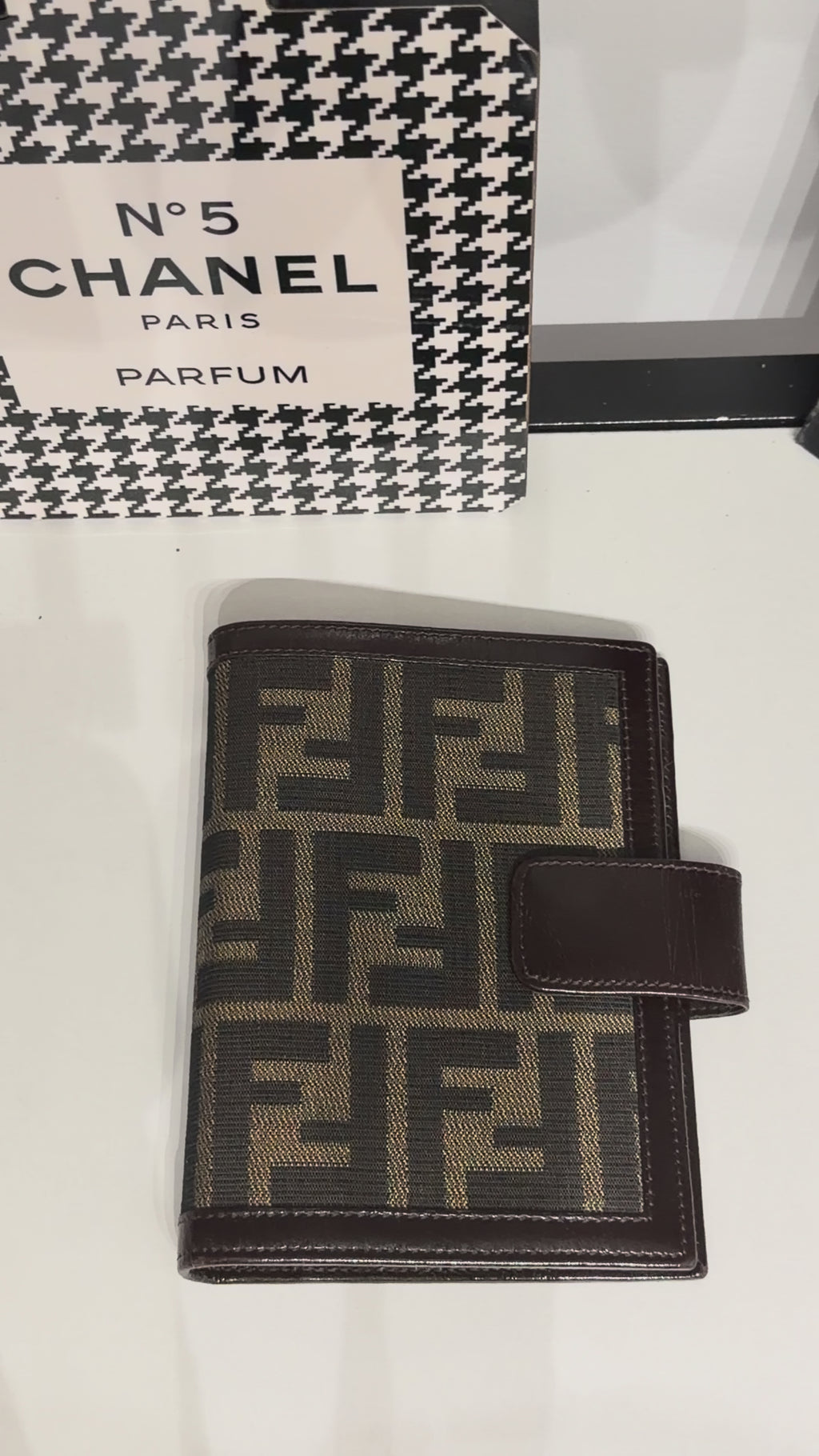 vintage Fendi agenda cover featuring the iconic brown and black Zucca FF monogram canvas with dark brown leather trim.