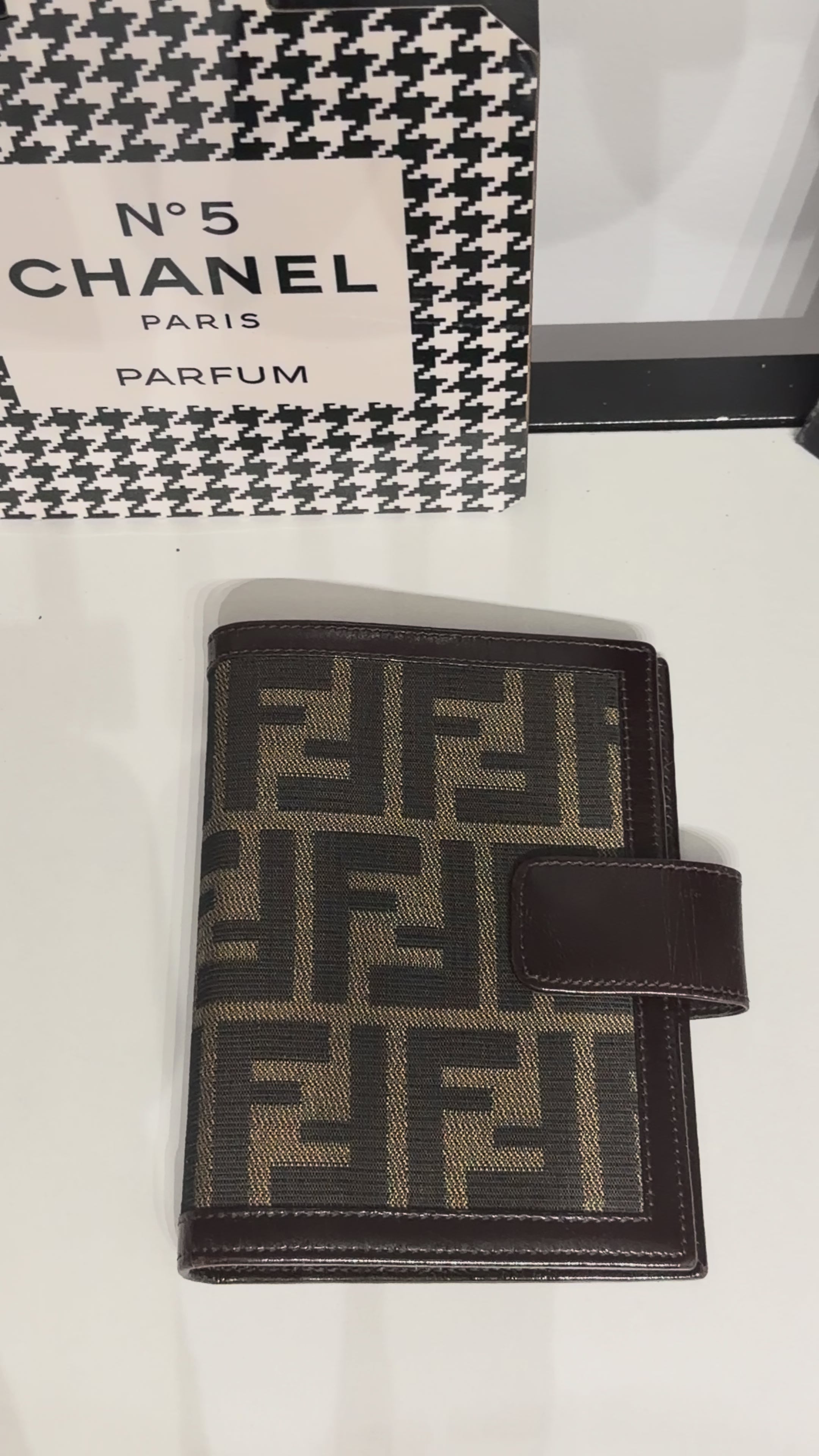 vintage Fendi agenda cover featuring the iconic brown and black Zucca FF monogram canvas with dark brown leather trim.