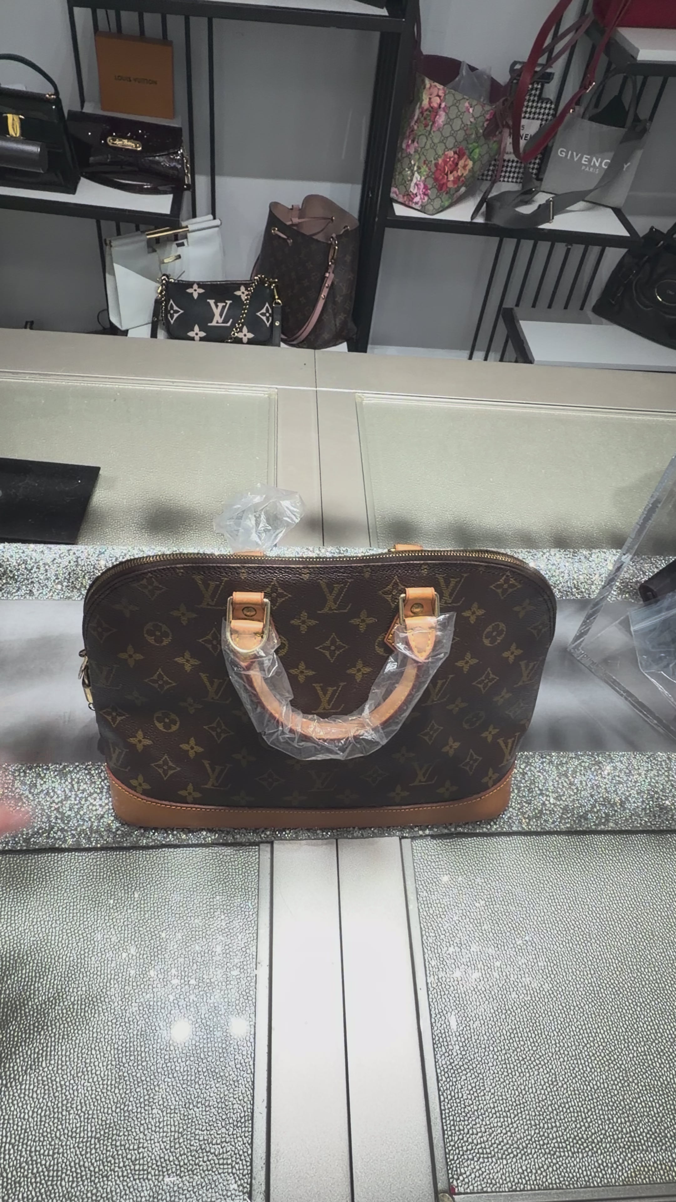 Louis Vuitton Alma PM Monogram Canvas Handbag