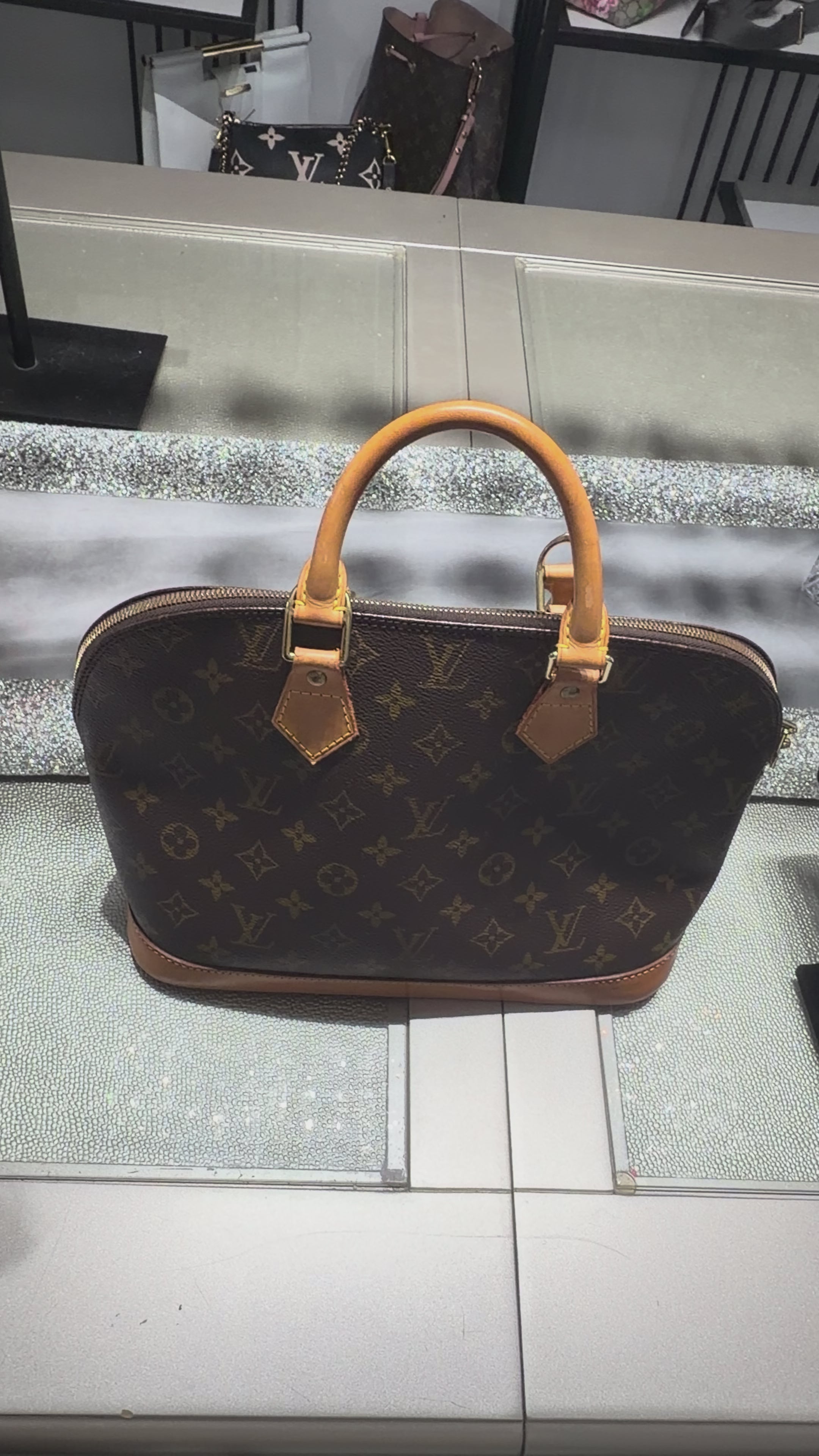 Louis Vuitton Alma PM Monogram Canvas Top Handle Bag